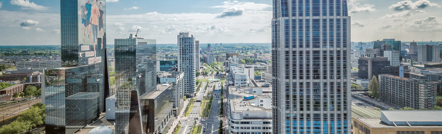 Cloudy; Cityscape (Rotterdam) with skyscrapers in foreground